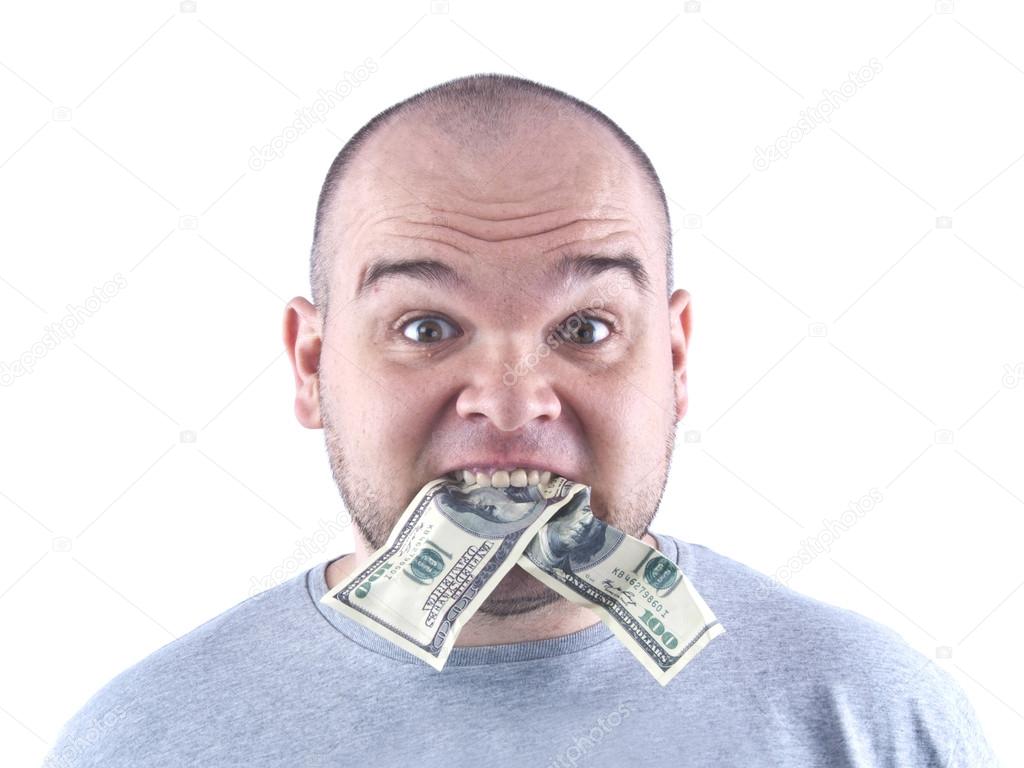 Man eats dollars