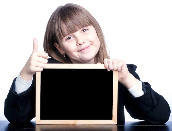 Teen school girl with a black board — Stock Photo, Image