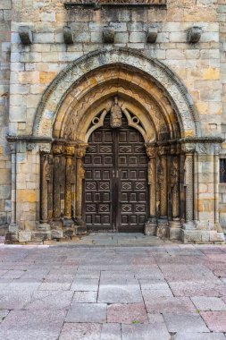 Main entrance of the romanesue church of Santa Maria de la Oliva clipart