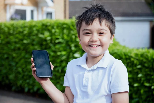 Cute Boy Showing His Photo Mobile Phone Child Using Camera — Φωτογραφία Αρχείου