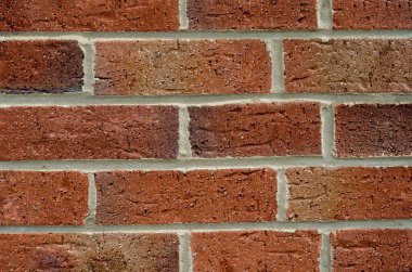 Macro Brick Wall, turuncu kahverengi grunge tuğla zemin, kırık tuğla desenli yatay arkaplan deseni, çatlaklı ve çizikli eski antika ev cephesi duvarı, klasik tarz kirli.