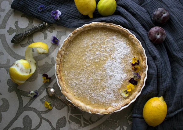 French tart with a lemon flavored filling. Close up photo of sweet pie.