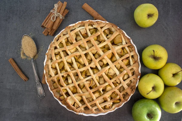 Apple pie. Classic autumn cake on a table. Fresh baked homemade dessert.