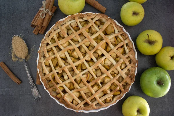 Apple pie. Classic autumn cake on a table. Fresh baked homemade dessert.