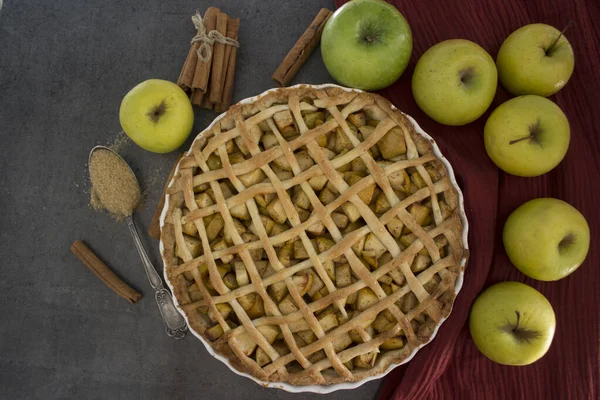 Apple pie. Classic autumn cake on a table. Fresh baked homemade dessert.