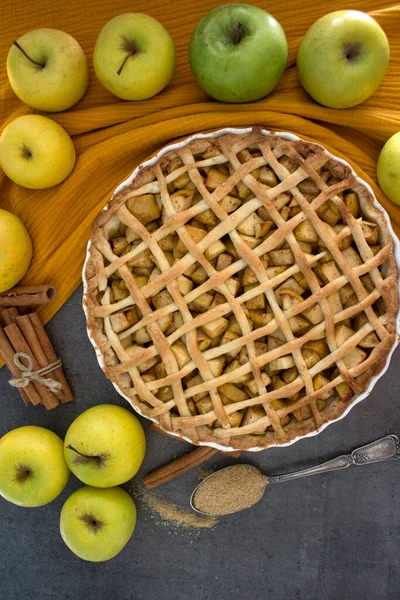 Apple pie. Classic autumn cake on a table. Fresh baked homemade dessert.