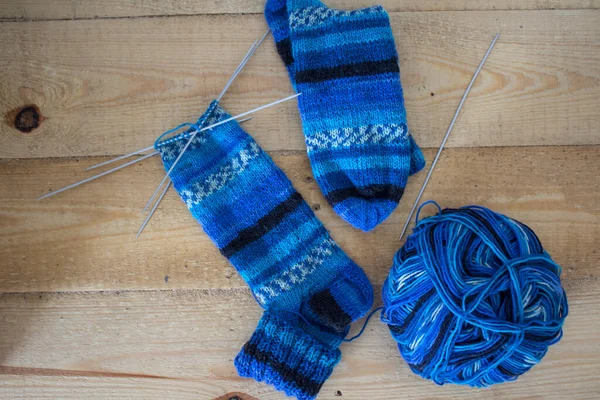 Knitting Socks Blue Gradient Yarn Knitting Needles Two Striped Socks — Stock Photo, Image