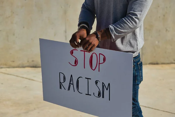 African American Person Shackles His Hands Holding Banner Racism Stop — Stock Photo, Image