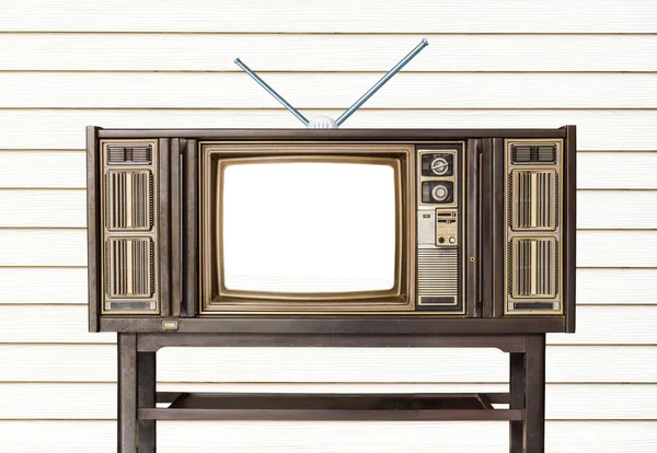 老旧的木制家用电视接收机 装在白木墙上的旧桌子上 或在旧桌子上 装有电视天线 — 图库照片