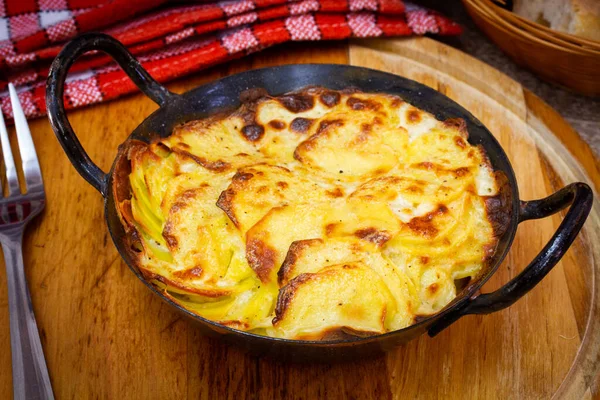 Gratin Dauphinois Black Casserole Dish Handles Fork Nearby — Stock Photo, Image