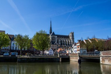 city and cathedral of the city of Amiens in France clipart