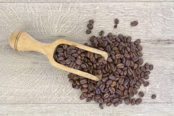 Granos Café Cuchara Madera Sobre Fondo Madera — Foto de Stock