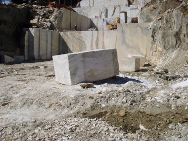 mining in a marble quarry, resource extraction in a stone pit