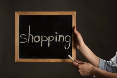 Tüketim, iş ve ekonomi simgesi olarak bir alışveriş işareti