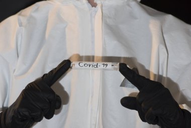 COVID-19 etiketli test tüpü, corona virüsü salgını ve sağlık