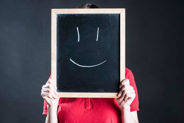 laughing and smiling when in a good and happy mood