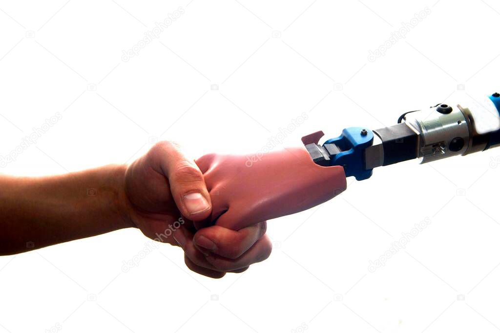 human hand touches a prosthetic hand, human encounters a machine