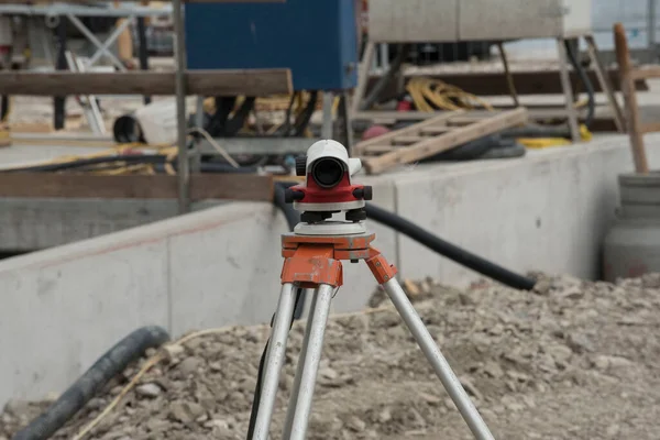 surveying by a land surveyor with measure instruments in geodesy