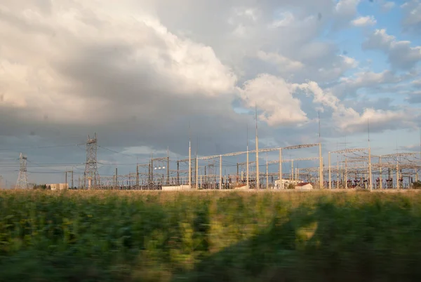 an electrical substation and electricity transformer as part of the power grid