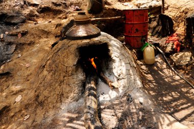 Hindistan 'ın Goa bölgesinde üretilen damıtılmış içki.