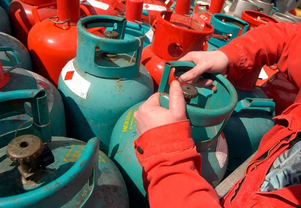 bottled gas in gas cylinders, for the storage and transportation