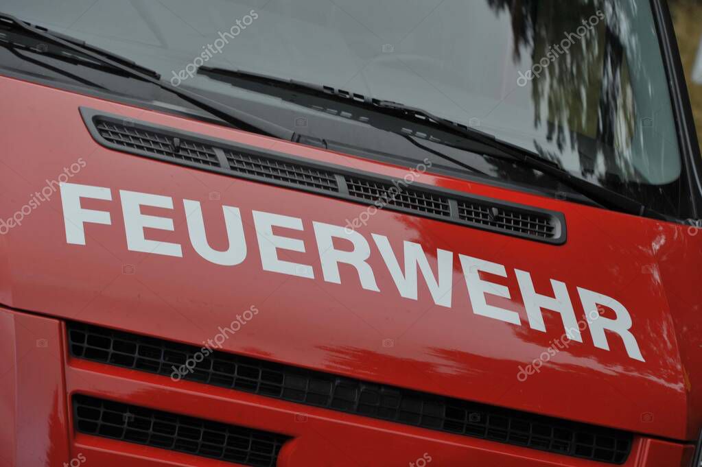 A fire department sign in german (Feuerwehr), rescue and emergency services