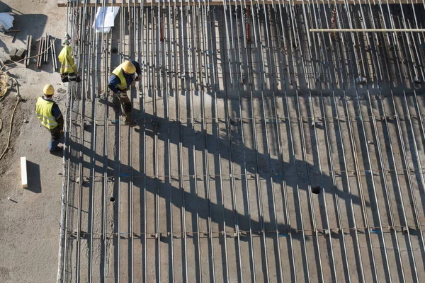 construction worker at a building site, employee in construction industry