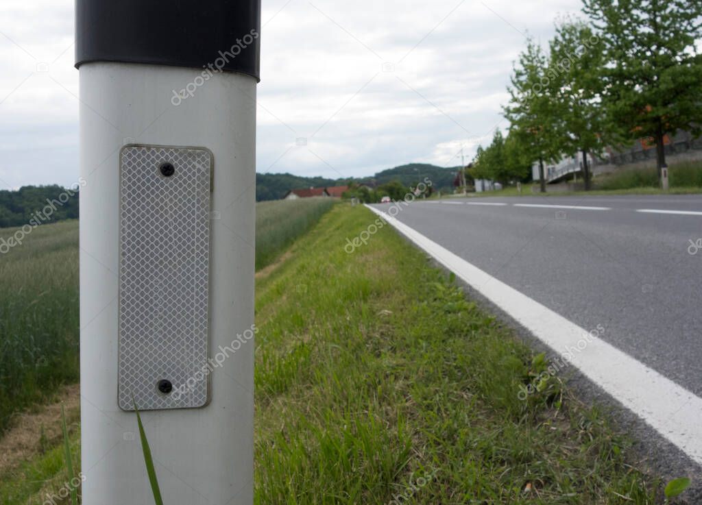 road marking and reflector post as safety measure on the road