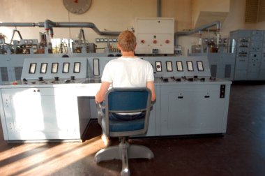 in an analog control room, controlling machines and working processes clipart