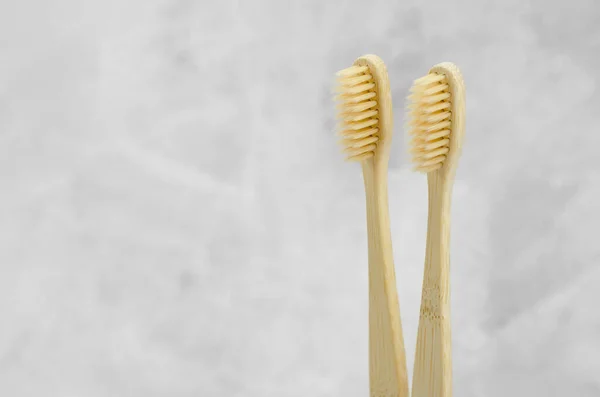 Eco Friendly Toothbrushes Two Bamboo Toothbrushes Concrete Background Place Text — Stock Photo, Image