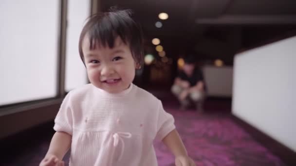 Asian Happy Infant Little Girl Smiling While Walking Camera Family — Stock Video