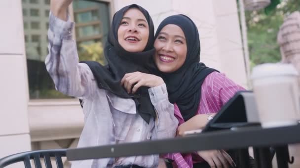 Two Asian Muslim Females Wear Hijab Afternoon Coffee Break Showing — Stock Video