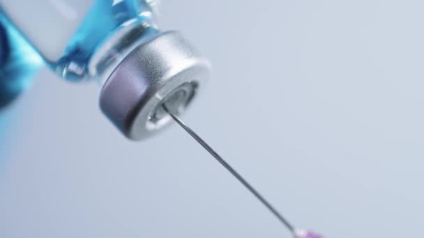 Closeup Needle Inserting Vaccine Vial Slowly Doctor Surgical Gloves Sucking — Stock Video