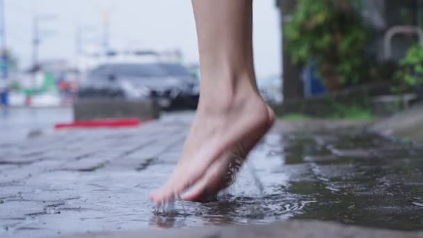 Close Light Skin Asian Girl Barefoot Stomp Playing Puddles Rain — Vídeos de Stock