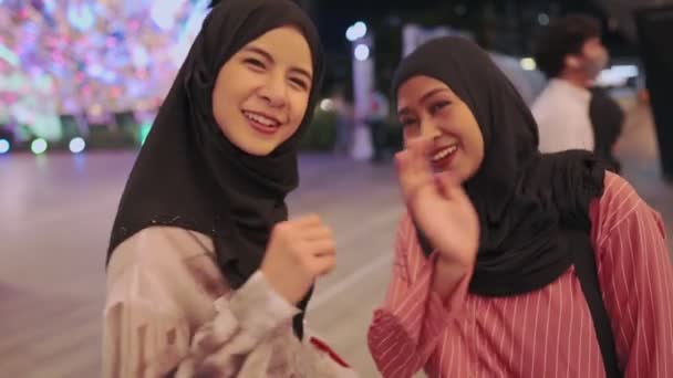 Attractive Asian Muslim Girls Looking Camera Positive Smiley Face Waving — Stock Video