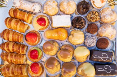 Close view of Italian pastries mix in a tray, christmas and event concept