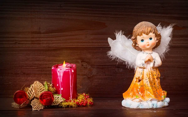 Christmas angel and candle — Stock Photo, Image