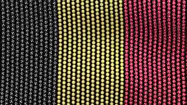 Flag of Belgium, consisting of many balls fluttering in the wind, on a black background. — Stock Video