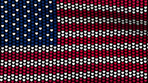 Αμερικανική σημαία κυματίζει στον άνεμο, που αποτελείται από τις καρδιές, πάνω σε μαύρο φόντο. Απρόσκοπτη βίντεο βρόχου. — Αρχείο Βίντεο