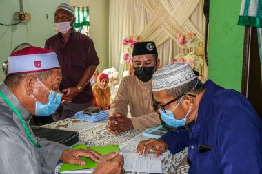 KUALA LUMPUR, MACH 2021. Geleneksel Malezya düğünü sahnesi 