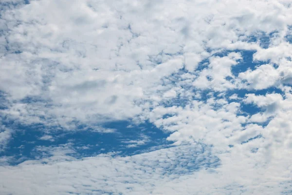 Blue sky and gray clouds on a clear day