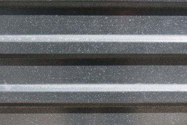 Bükülmüş parlak metal plaka dokusu