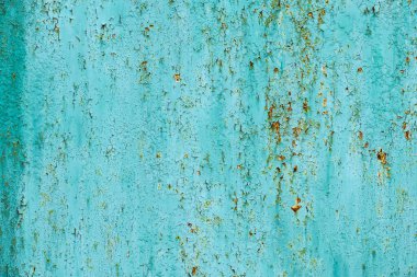 Metal bir plakanın dokusu yeşile boyanmış.