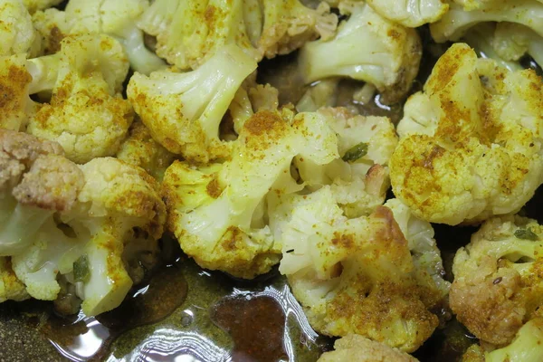 Fried cauliflower with oil in a pan
