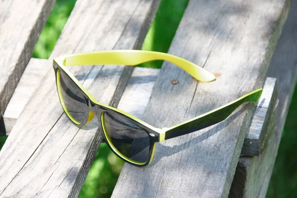 Black Sunglasses Women Yellow Frame Wooden Board — Stock Photo, Image