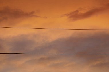 Red-yellow sky at sunrise in August