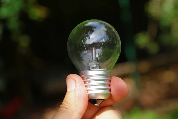 Non Working Glass Incandescent Lamp Hand — Stock Photo, Image