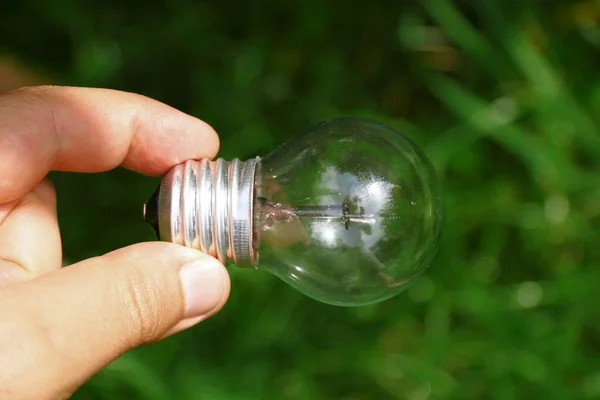 Non Working Glass Incandescent Lamp Hand — Stock Photo, Image