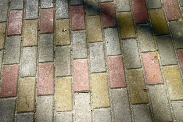 Textur Des Farbigen Betonpflasters Auf Dem Bürgersteig — Stockfoto