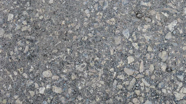 道路上用作背景的小石块的纹理 — 图库照片